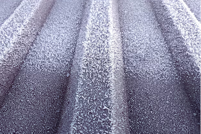 Morning frost condensation on metal roof
